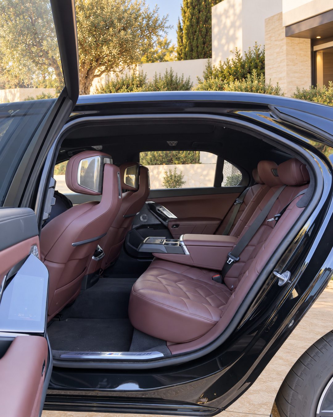BMW 7 Series executive rear seats with brown leather upholstery