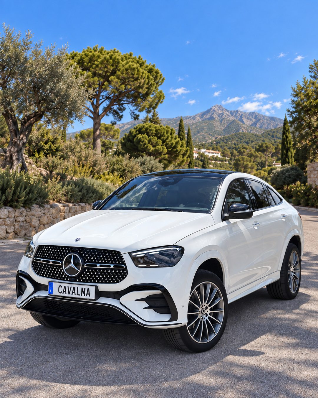 White Mercedes-Benz GLE 300d viewed from the front three-quarter angle