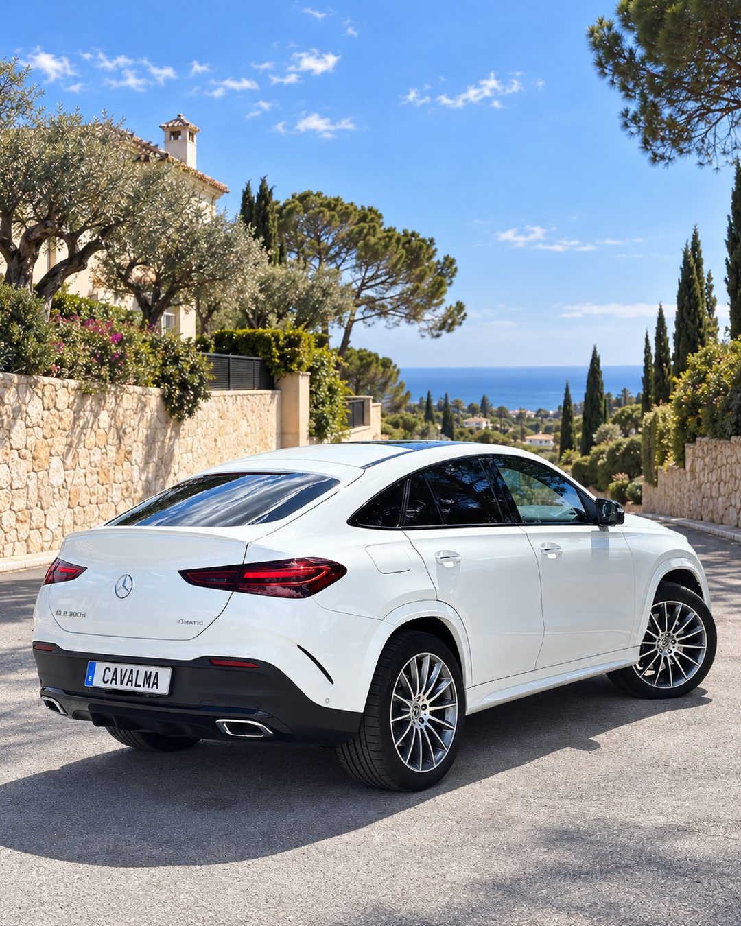 White Mercedes-Benz GLE 300d viewed from the rear three-quarter angle
