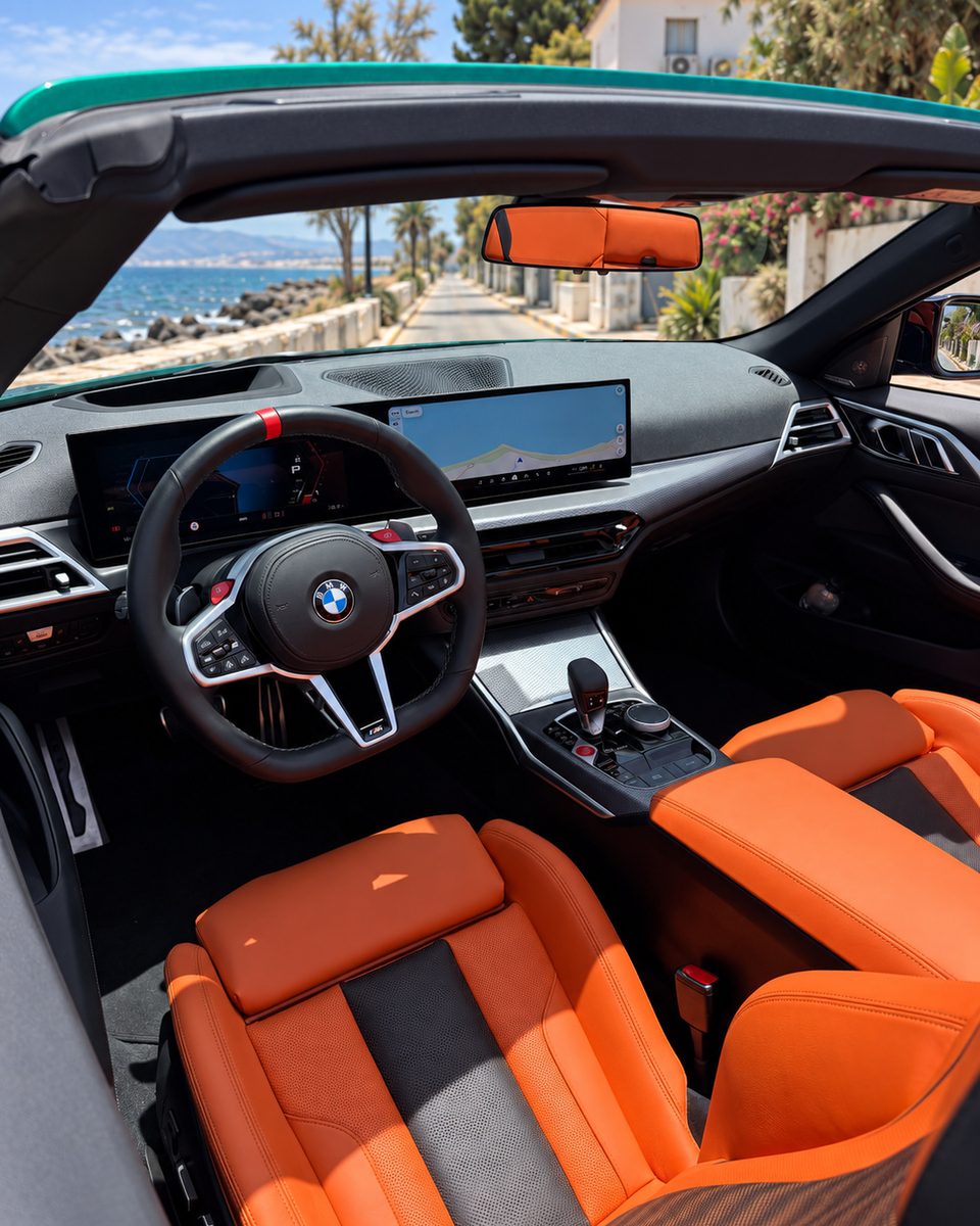 BMW M4 Cabrio cockpit and steering wheel, luxury car rental in Marbella